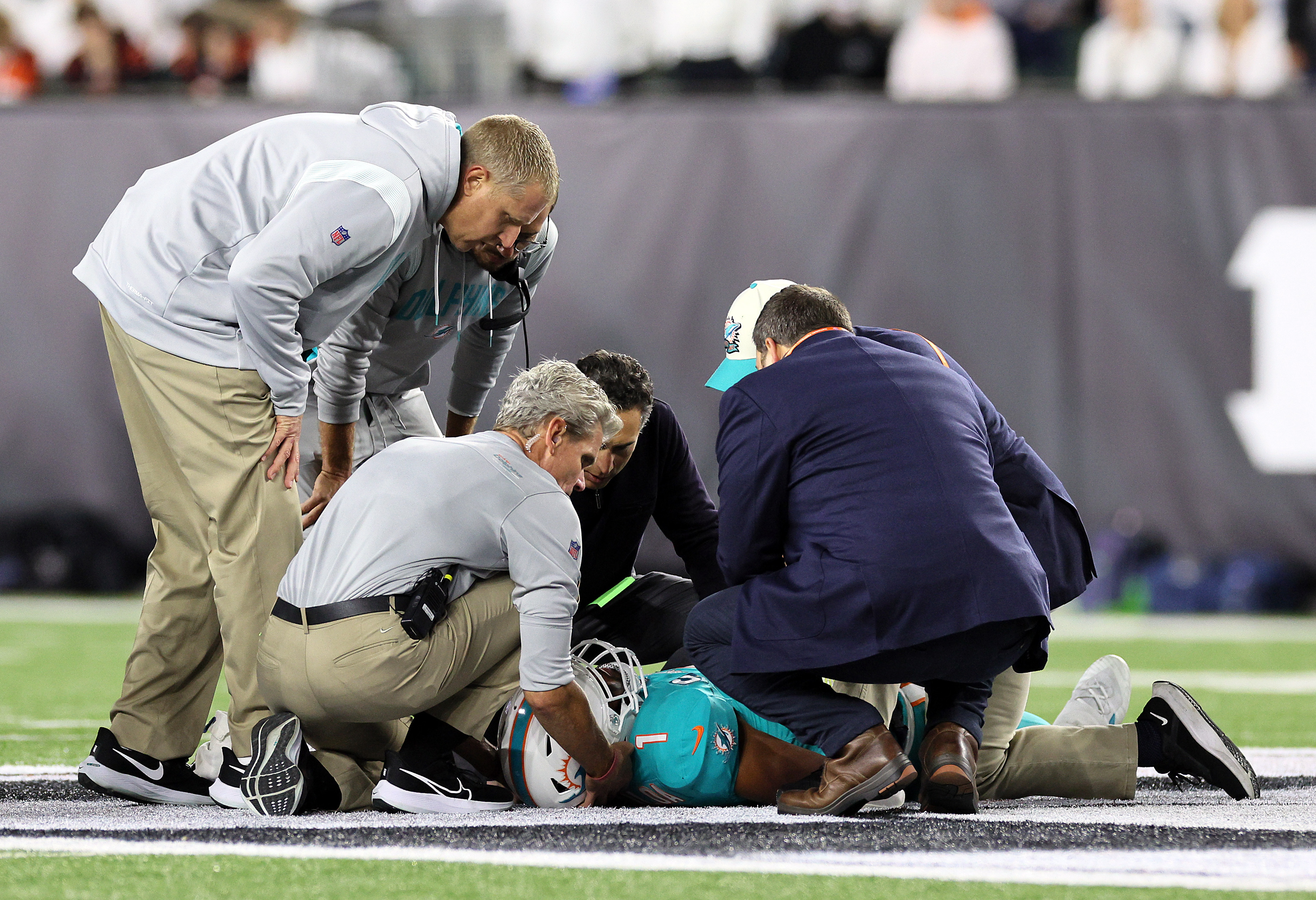 Tua Tagovailoa lies on the ground after suffering a concussion.