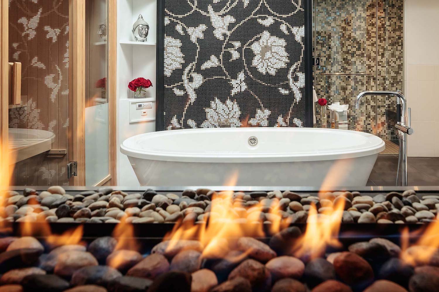 bathroom with a fireplace and sauna at camden harbour inn