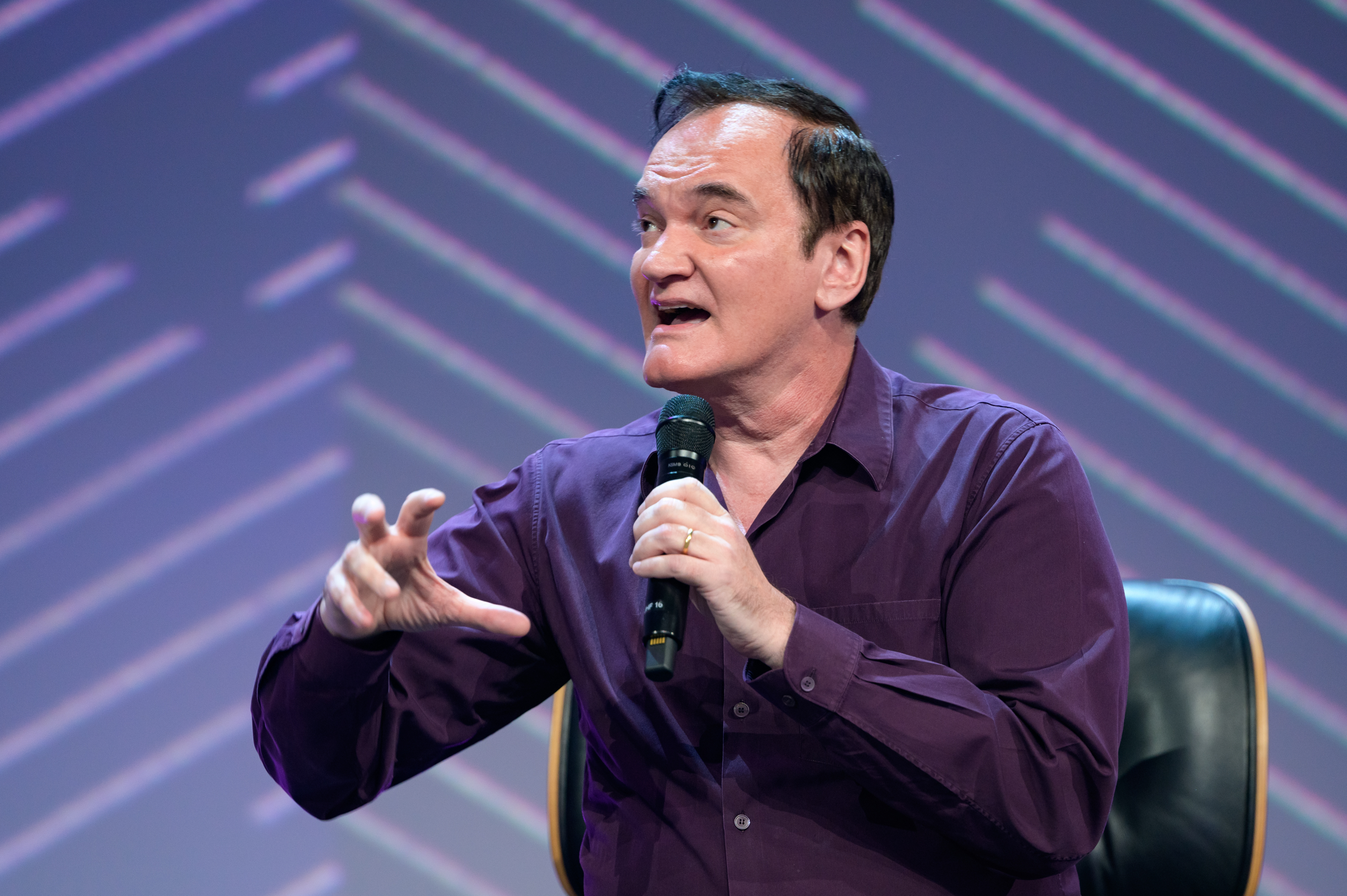 Quentin Tarantino gestures during his appearance at the OMR digital festival in Hamburg.