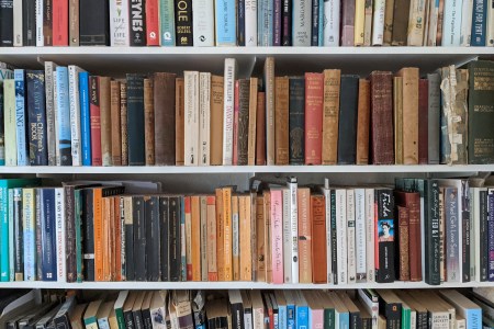 A shelf full of books. If you buy more books than you read, you should hear about the Japanese philosophy of "tsundoku."