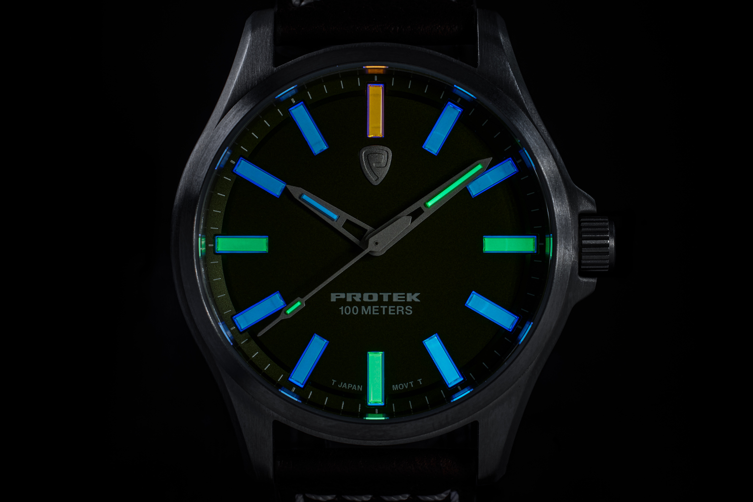 a light up watch on a black background