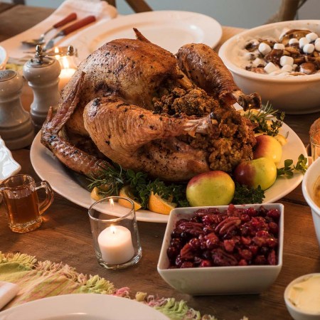 Dining table filled with Thanksgiving food. According to the Farm Bureau, this year's Thanksgiving dinner will see a significant price hike.