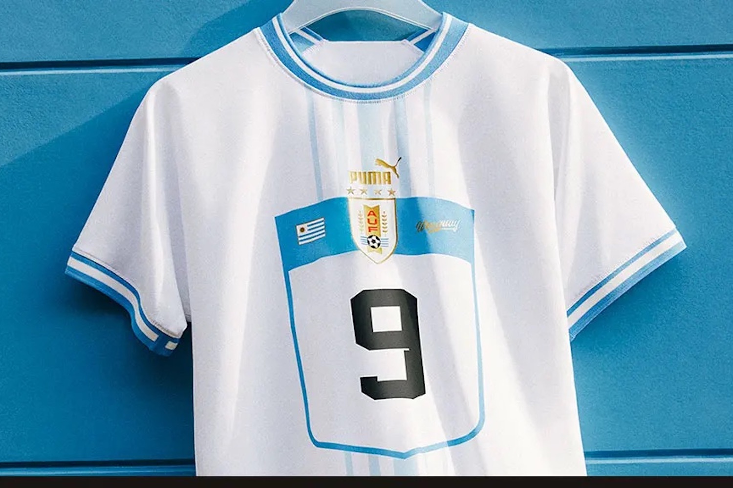 a white soccer jersey on a blue background