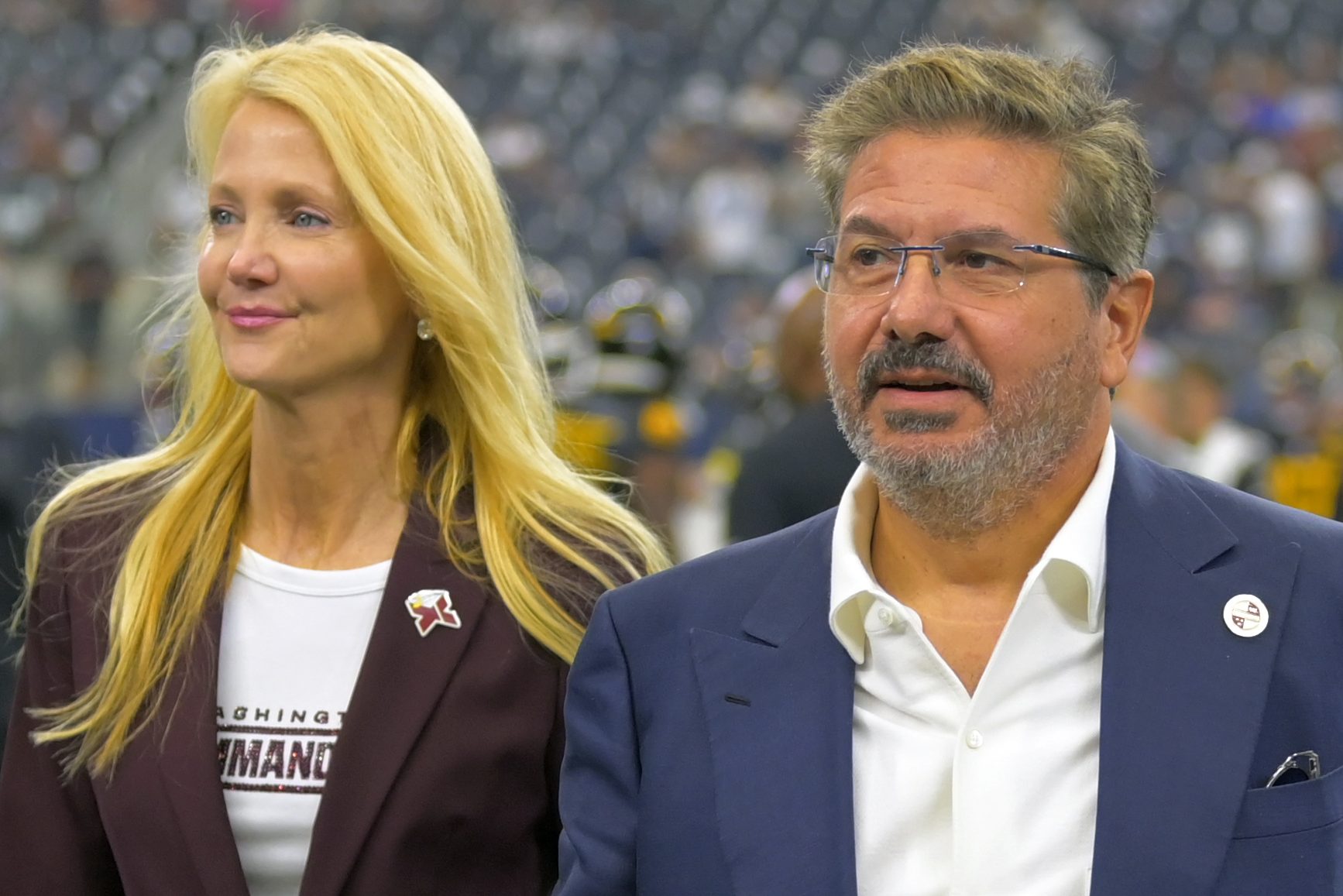 Washington owners Tanya Snyder and Dan Snyder on the field.