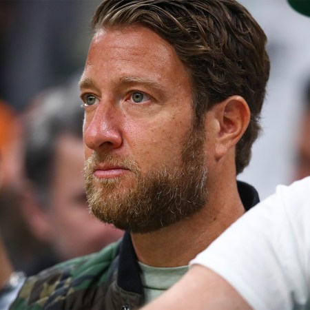 Barstool Sports founder Dave Portnoy at a basketball game. Portnoy's lawsuit against Insider was dismissed in November 2022.