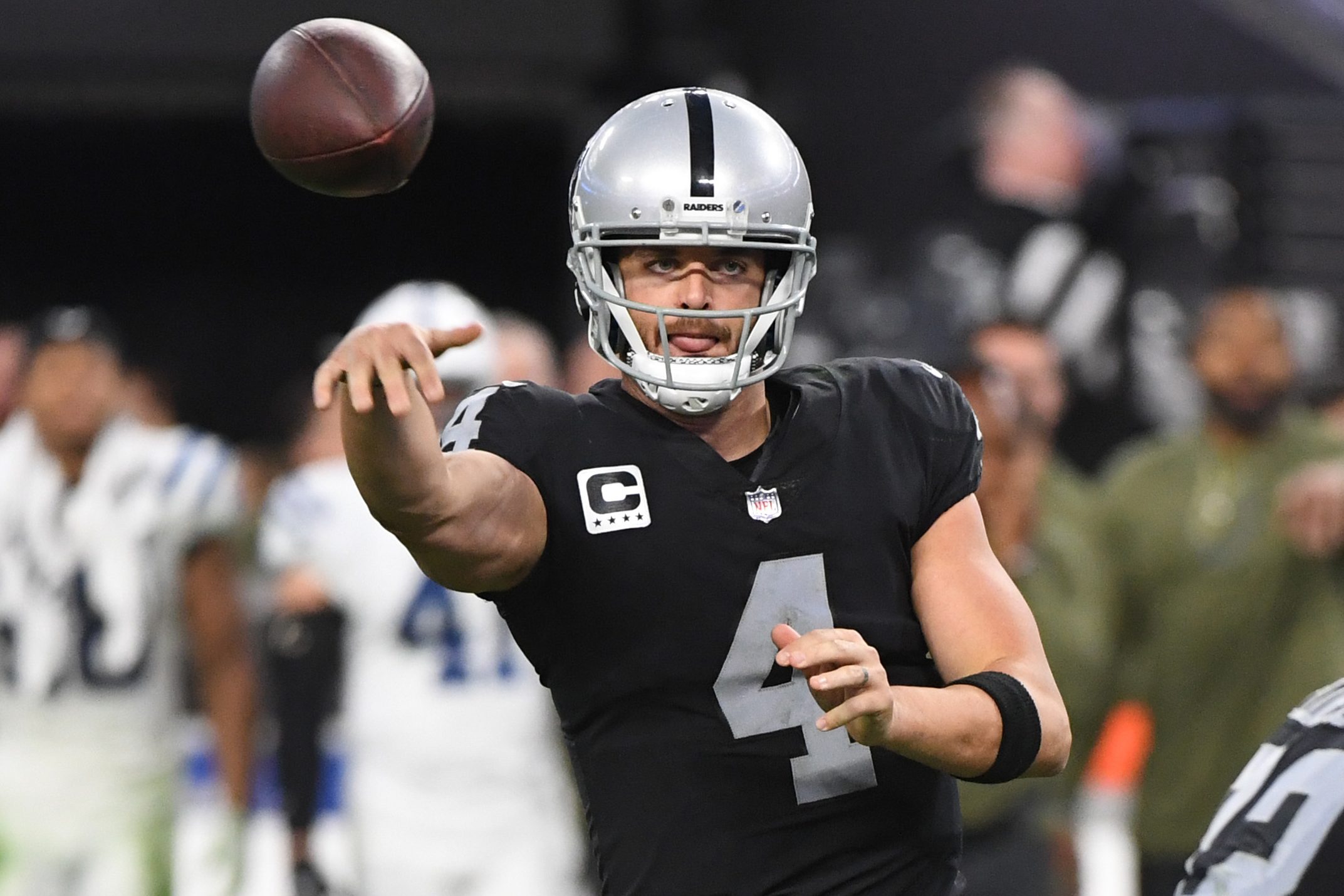 Derek Carr throws the ball in the fourth quarter against the Colts.