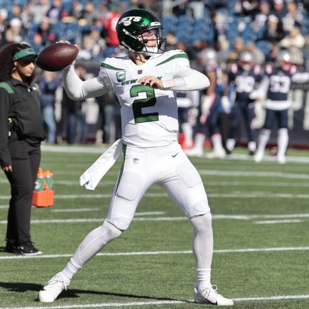 New York Jets quarterback Zach Wilson warms up before a game.