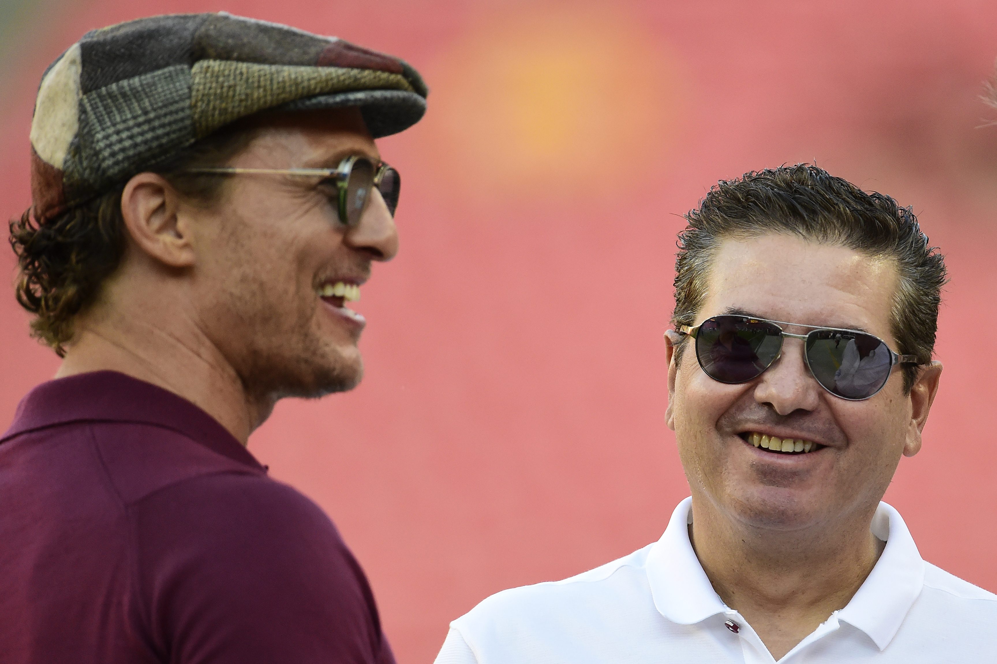 Matthew McConaughey talks with Washington owner Dan Snyder in 2019.