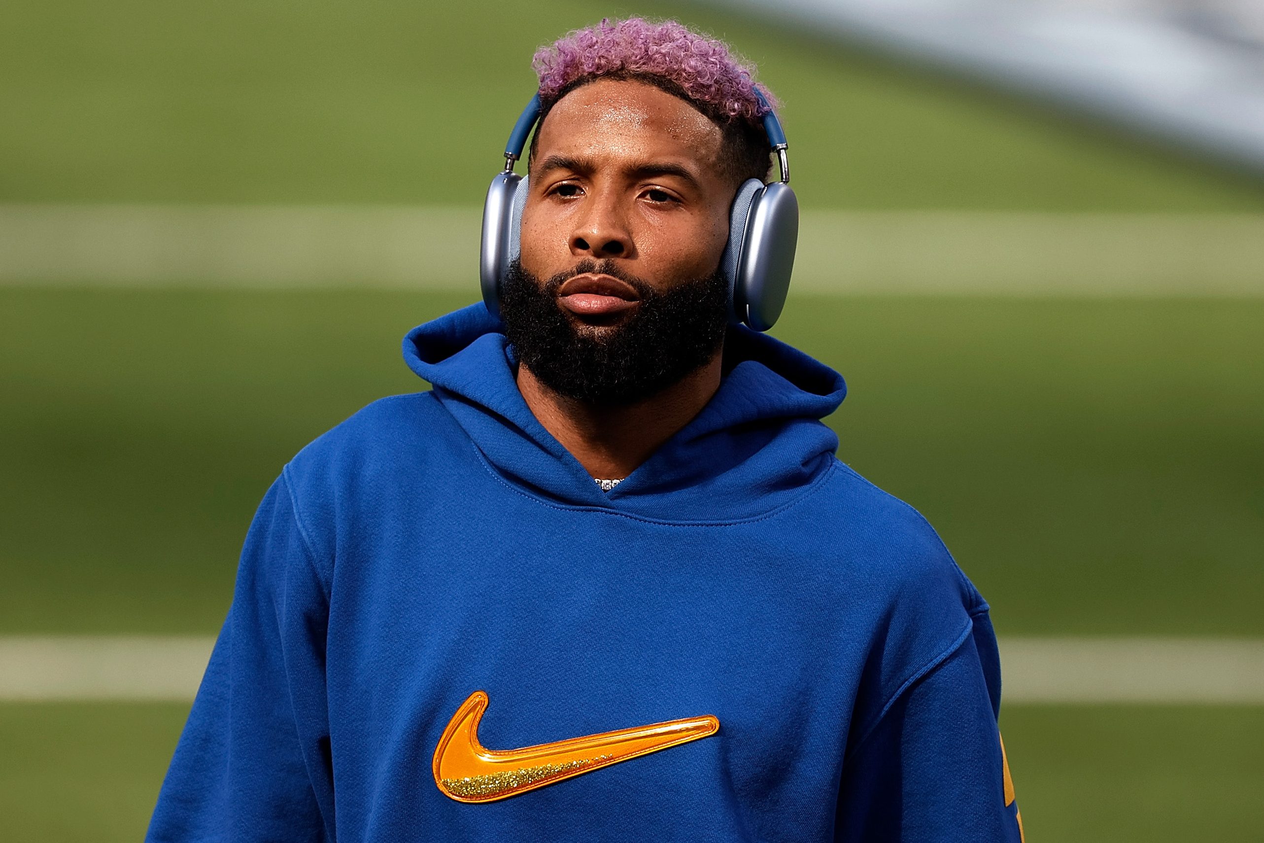 Odell Beckham Jr. warms up before Super Bowl LVI at SoFi Stadium in a Nike hoodie. He recently sued the company for more than $20 million for breach of contract.