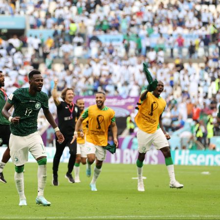 Saudi Arabia players celebrate their 2-1 win over Argentina in Qatar at the 2022 World Cup