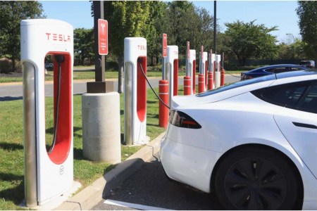 A Tesla car charging station in Garden City, New York. The carmakers has made multiple recalls recently.