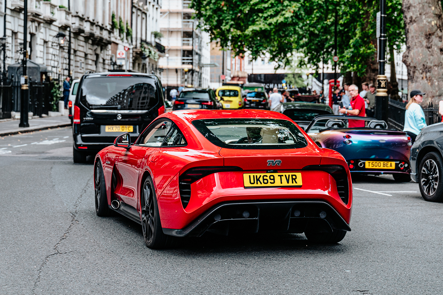 The rear of the new TVR Griffith V8 sports car driving down the road in the U.K.