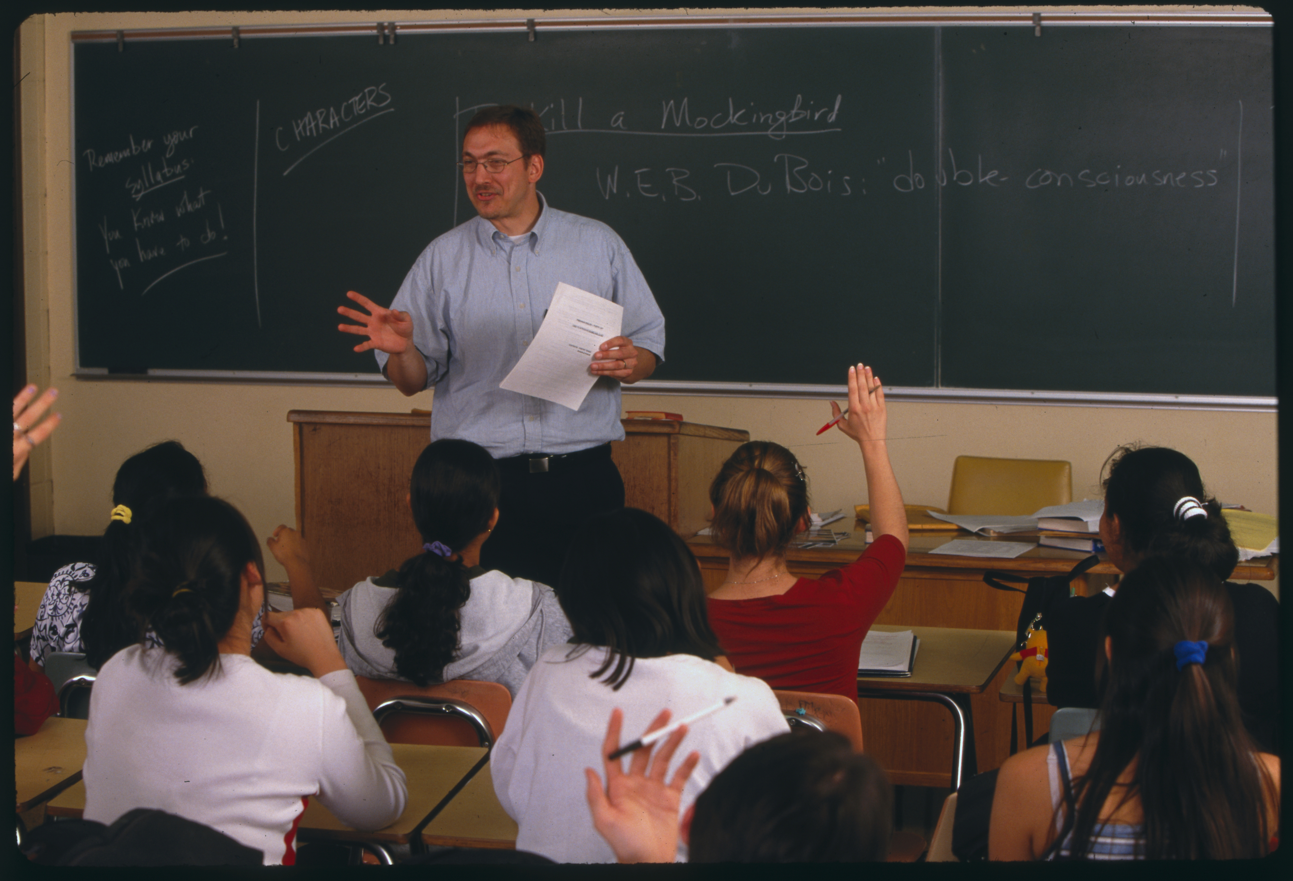 An English teacher in a classroom.