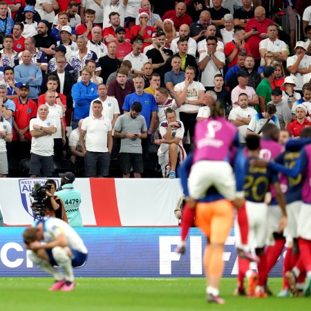 England supporters look on in despair after Harry Kane's penalty attempt sailed over the goalpoast.