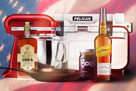 American-made gifts from our holiday gift guide: a KitchenAid stand mixer, two bottles of whiskey, a Pelican cooler, a Smithey skillet and a jar of chili oil