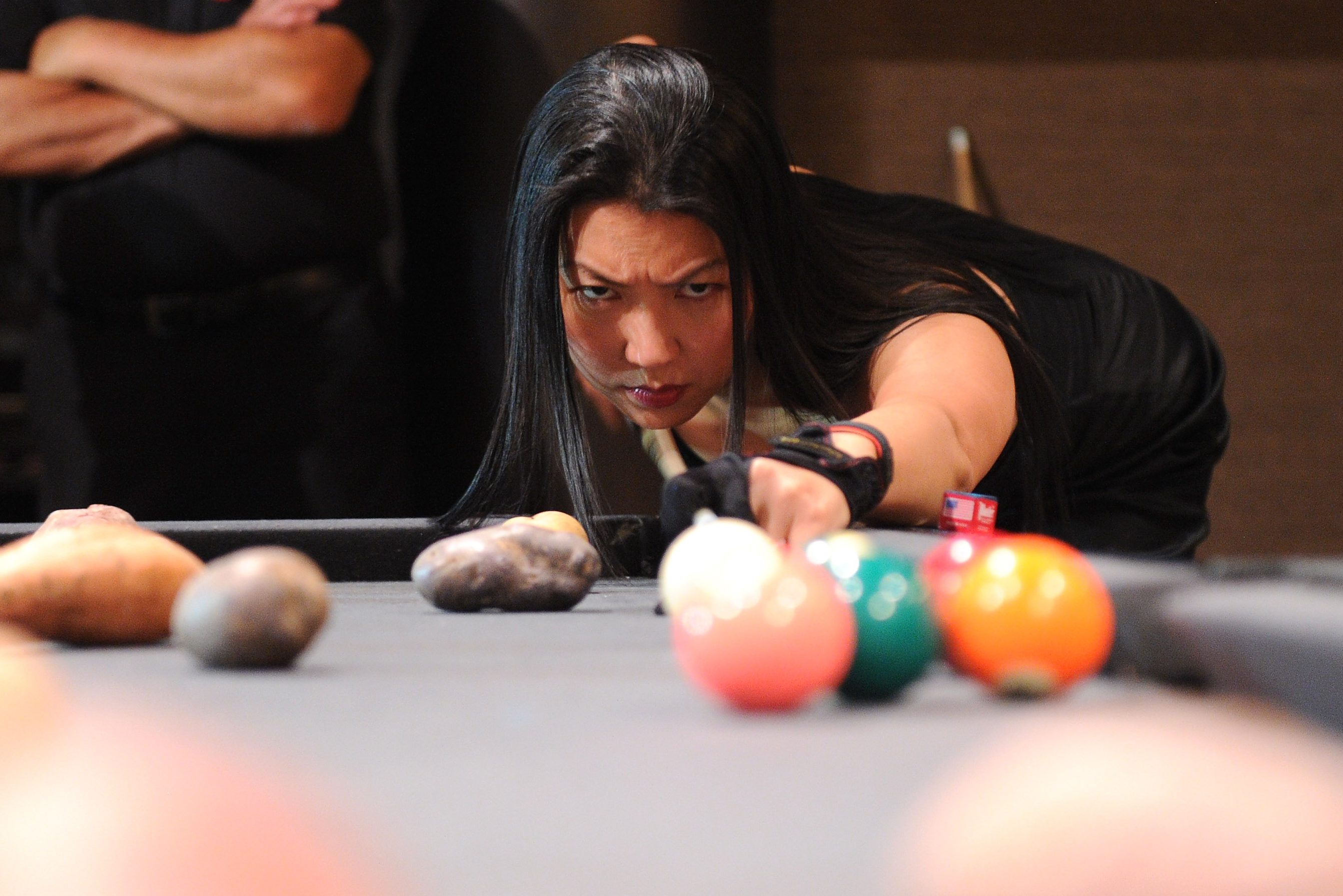 Jeanette Lee lines up a shot in New York City in 2011.