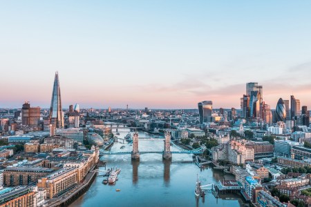 An elevated view of the London skyline at sunrise