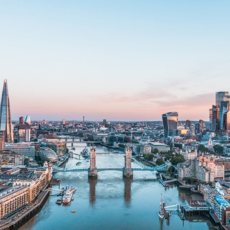 An elevated view of the London skyline at sunrise