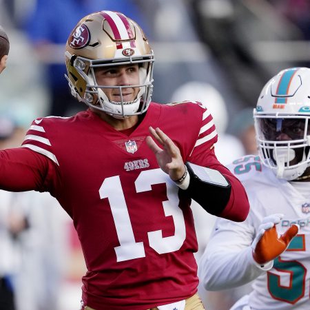 Brock Purdy of the 49ers throws a pass against the Dolphins.