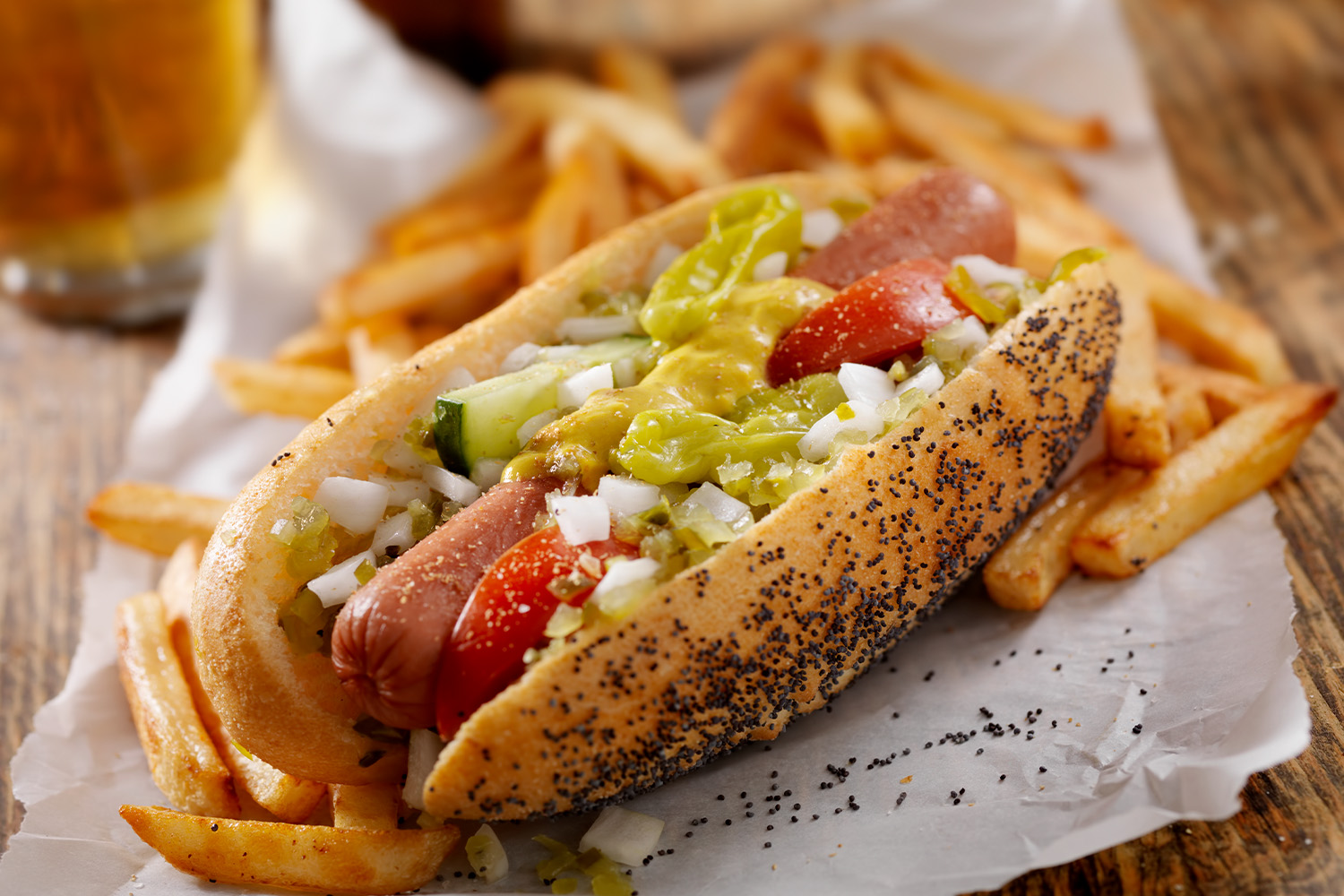 A Classic Chicago Dog with Fries and a Beer