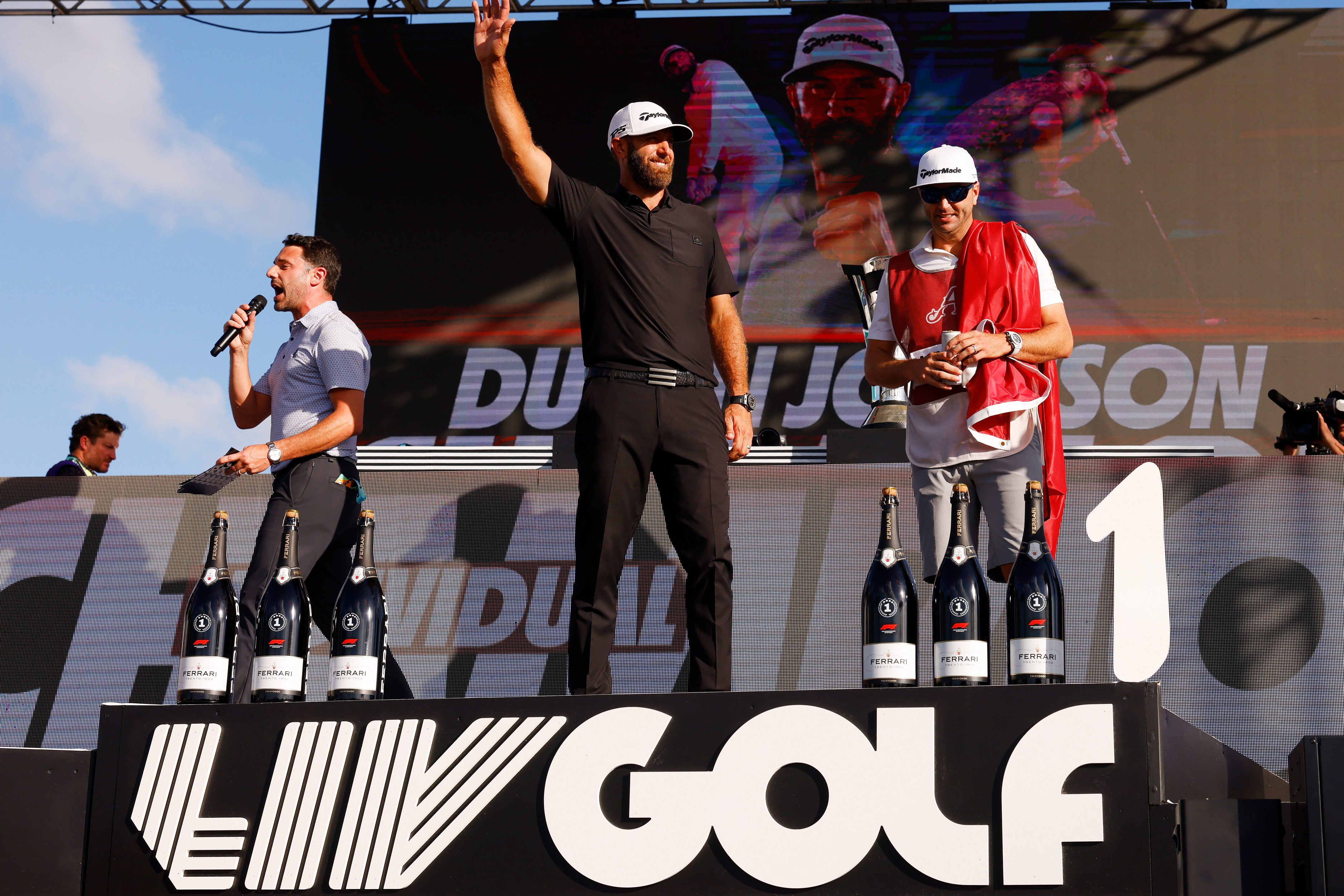 Dustin Johnson on stage at the LIV Golf Invitational - Miami.