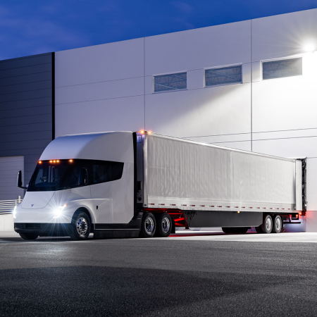 The Tesla Semi, an electric long-haul truck, pulled up to a loading dock at a warehouse