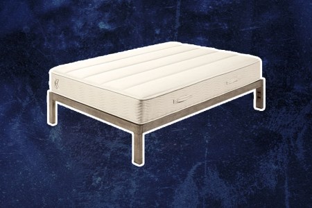 A Zinus mattress on a dark blue background