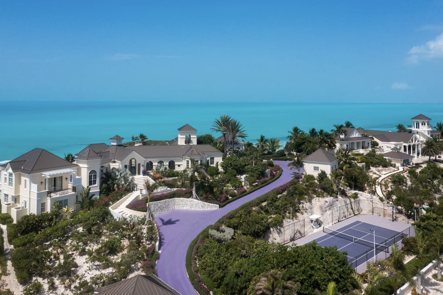 prince's caribbean estate with purple road and tennis court