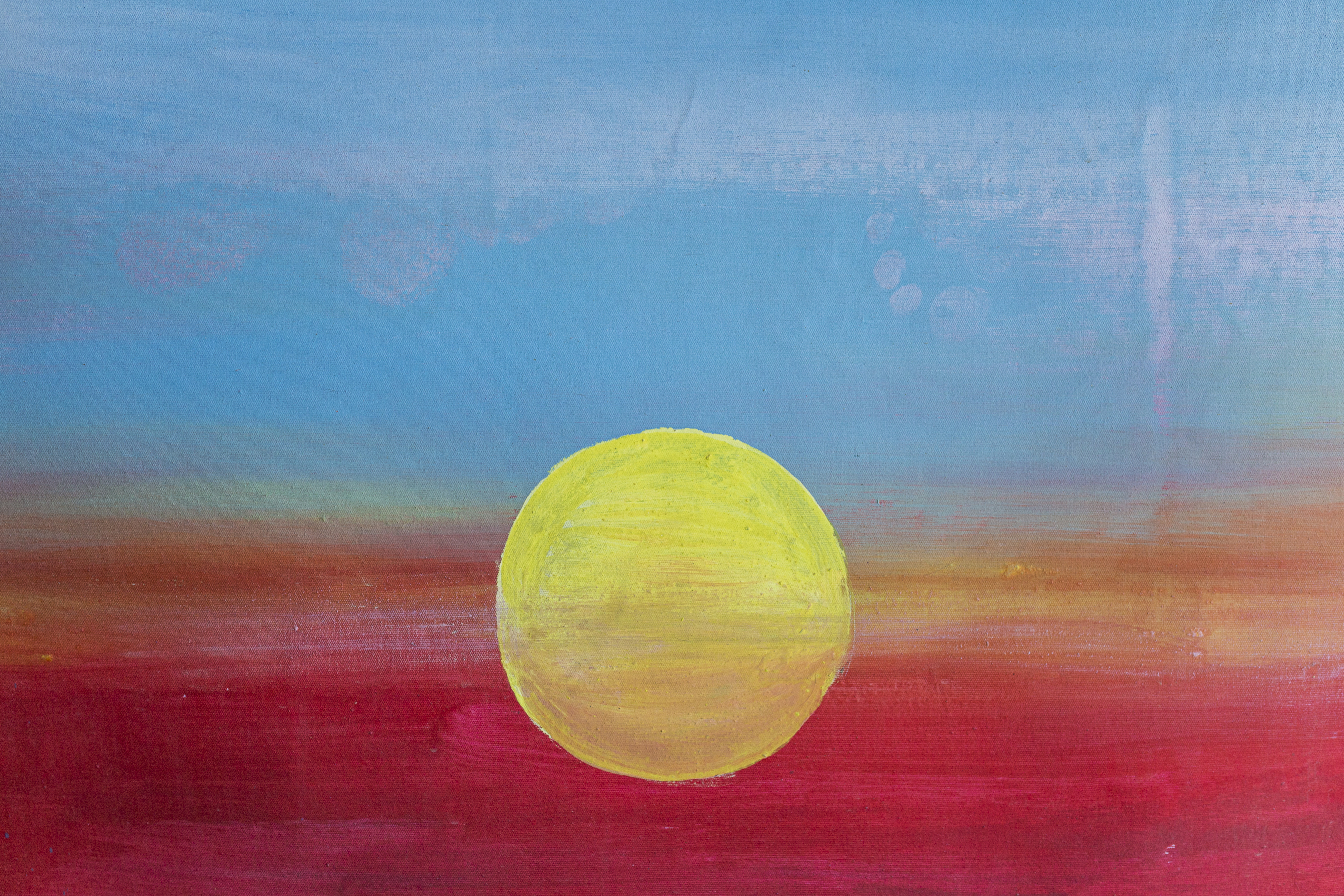 A painting of a setting sun.