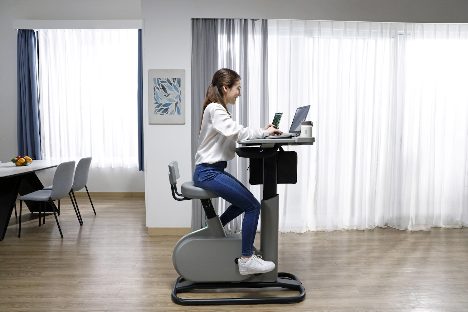 a model on an Acer bike-desk hybird