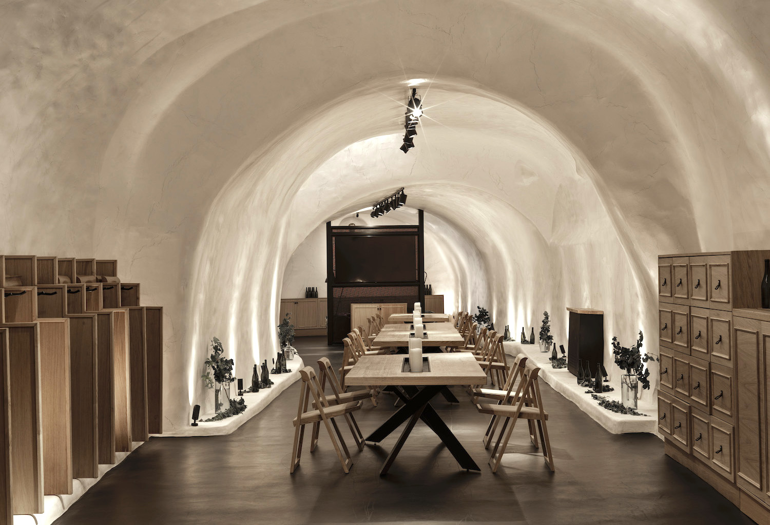 tables set up at selene antique caves in santorini