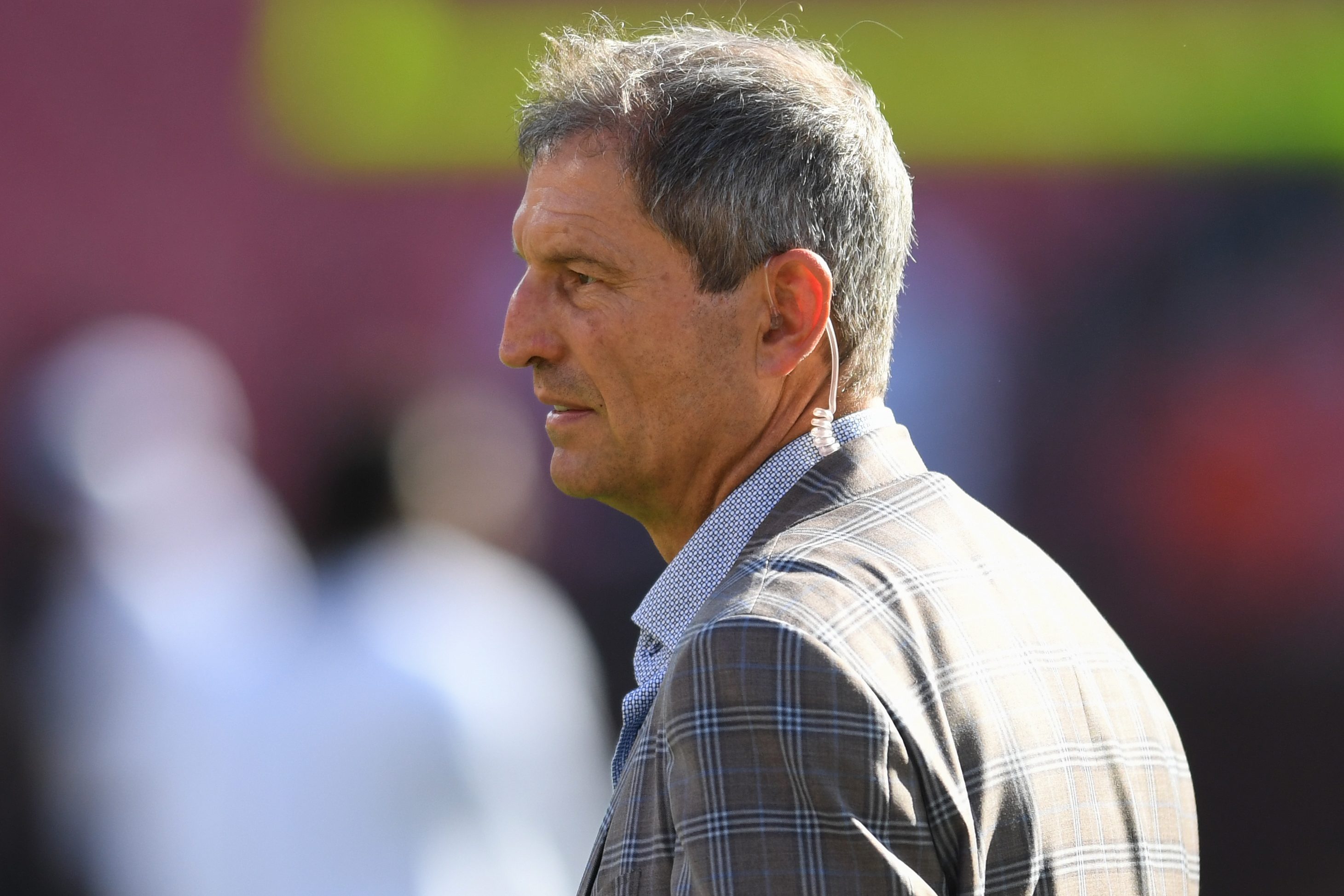 Ex-NFL quarterback Bernie Kosar on the field prior to a game.