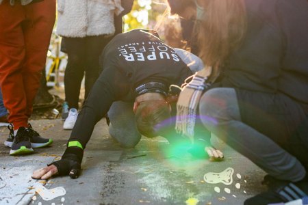 A graphic of Devon Lévesque completing the bear-crawl marathon.