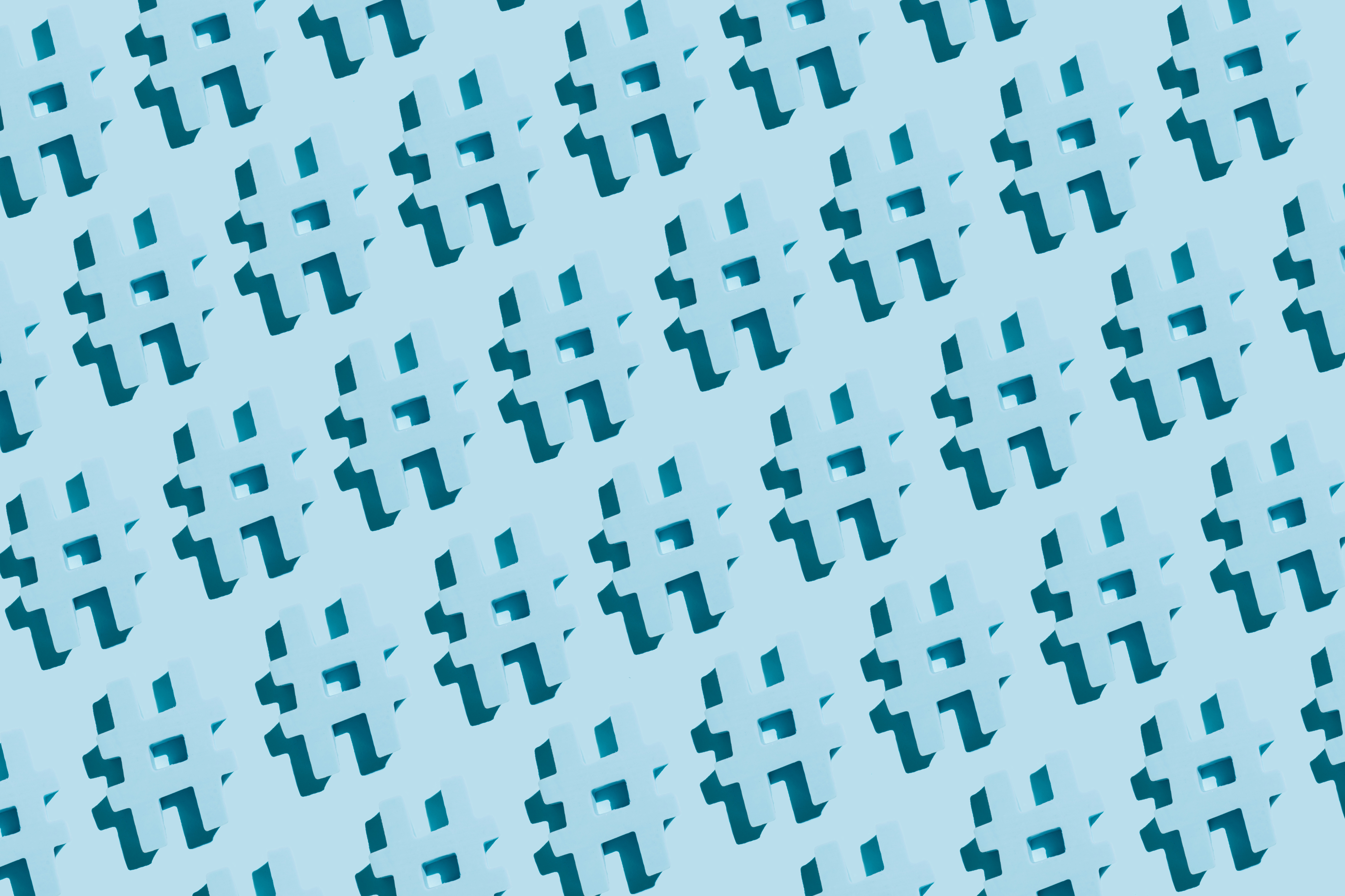 An illustration of hashtags against a blue background.