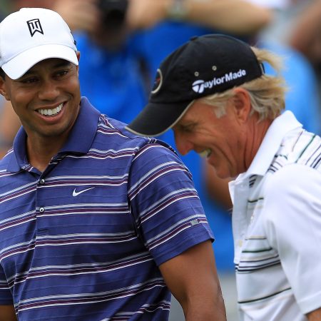 Tiger Woods with Greg Norman at the 2011 Australian Open in Sydney.