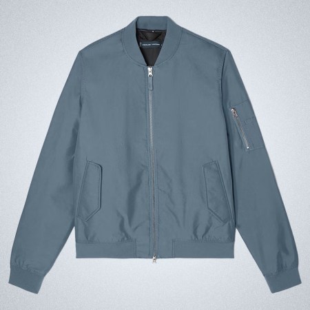 a grey everlane bomber jacket on a grey background