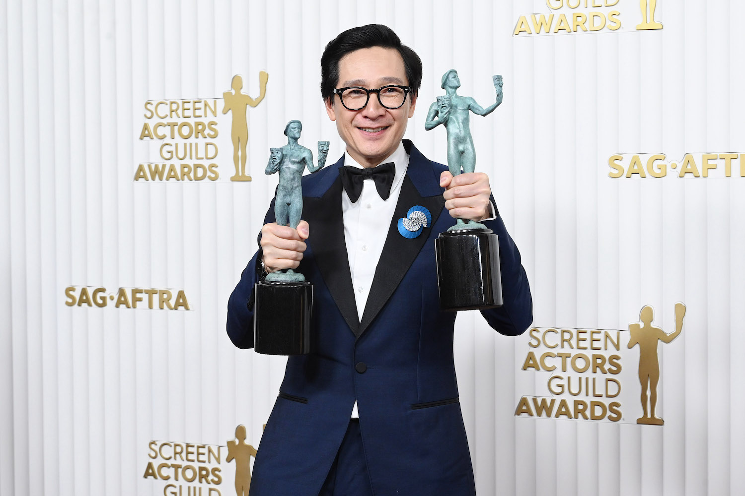 a photo of Ke Huy Quan at the 2023 SAG Awards red carpet