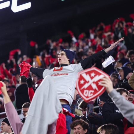 DC Defenders fans celebrate after a play during the second half of the XFL game between the DC Defenders and the Seattle Sea Dragons at Audi Field on February 19, 2023 in Washington, DC.