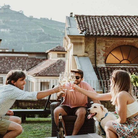 Three people drinking Spumante wine in Italy.