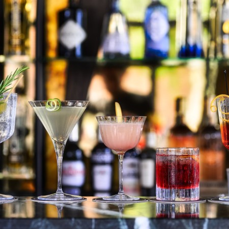 Several types of cocktails on a bar counter. According to one new study, cocktail prices are up by an average of $1 per drink.