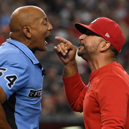 Oliver Marmol of the Cardinals argues with umpire CB Bucknor in 2022.