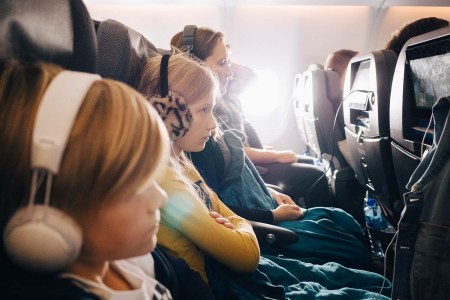 Family sitting together on a plane