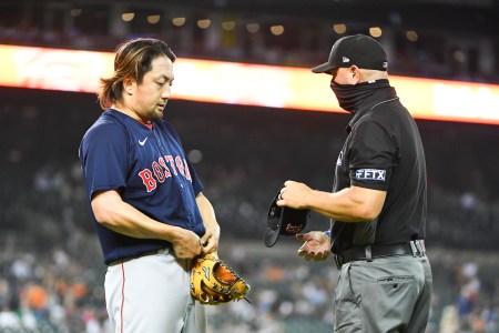 Boston Red Sox relief pitcher Hirokazu Sawamura (19) is checked for sticky substances by the umpire following the sixth inning during the Detroit Tigers versus the Boston Red Sox game on Wednesday August 4, 2021 at Comerica Park in Detroit, MI. (Photo by Steven King/Icon Sportswire via Getty Images)