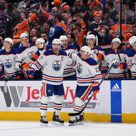 Connor McDavid celebrates a goal with teammates