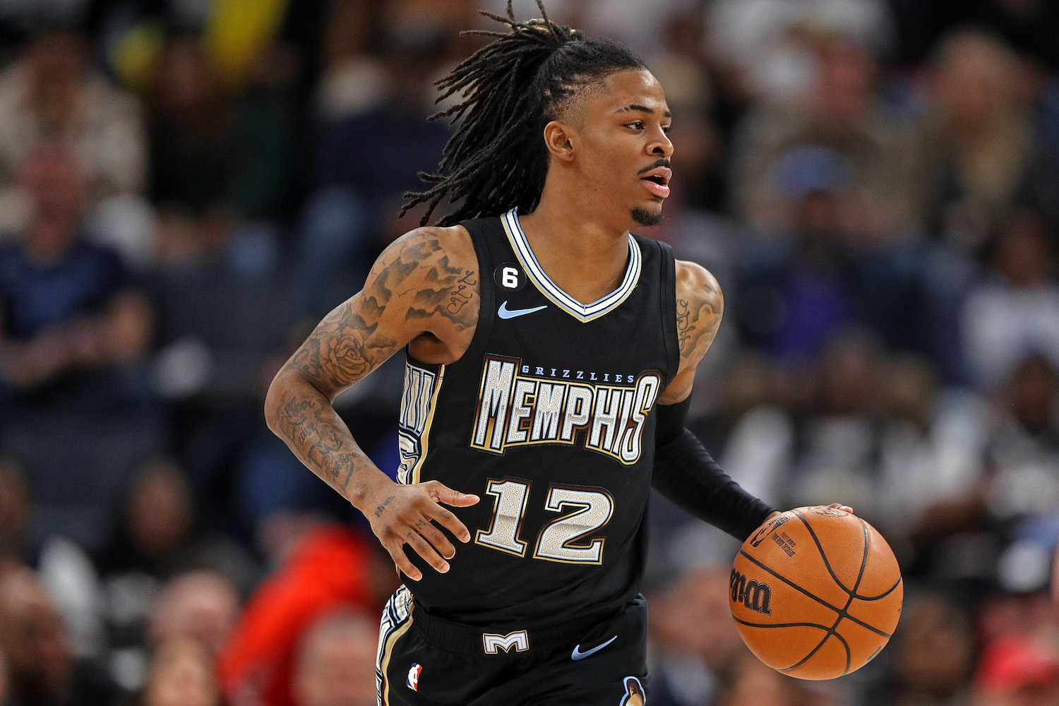 Morant of the Memphis Grizzlies brings the ball up court during the game against the Los Angeles Lakers at FedExForum