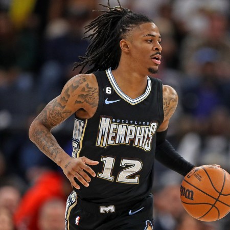 Morant of the Memphis Grizzlies brings the ball up court during the game against the Los Angeles Lakers at FedExForum