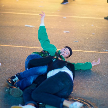 Drunk Men Lying On Road At Night