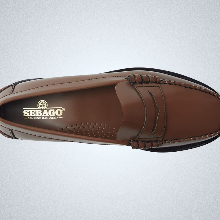 a brown leather Sebago Dan Classic Loafer on a grey background