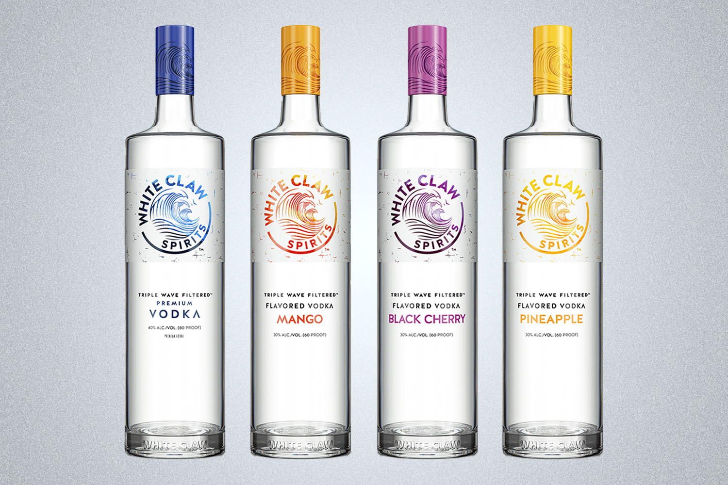 a set of White Claw premium vodka on a grey background