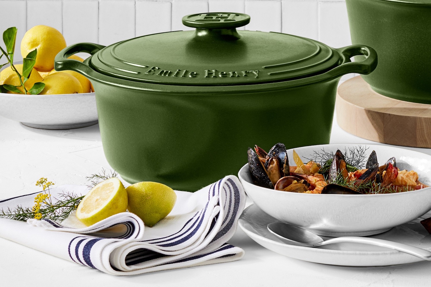 a Williams Sonoma cast iron dutch oven on a kitchen table